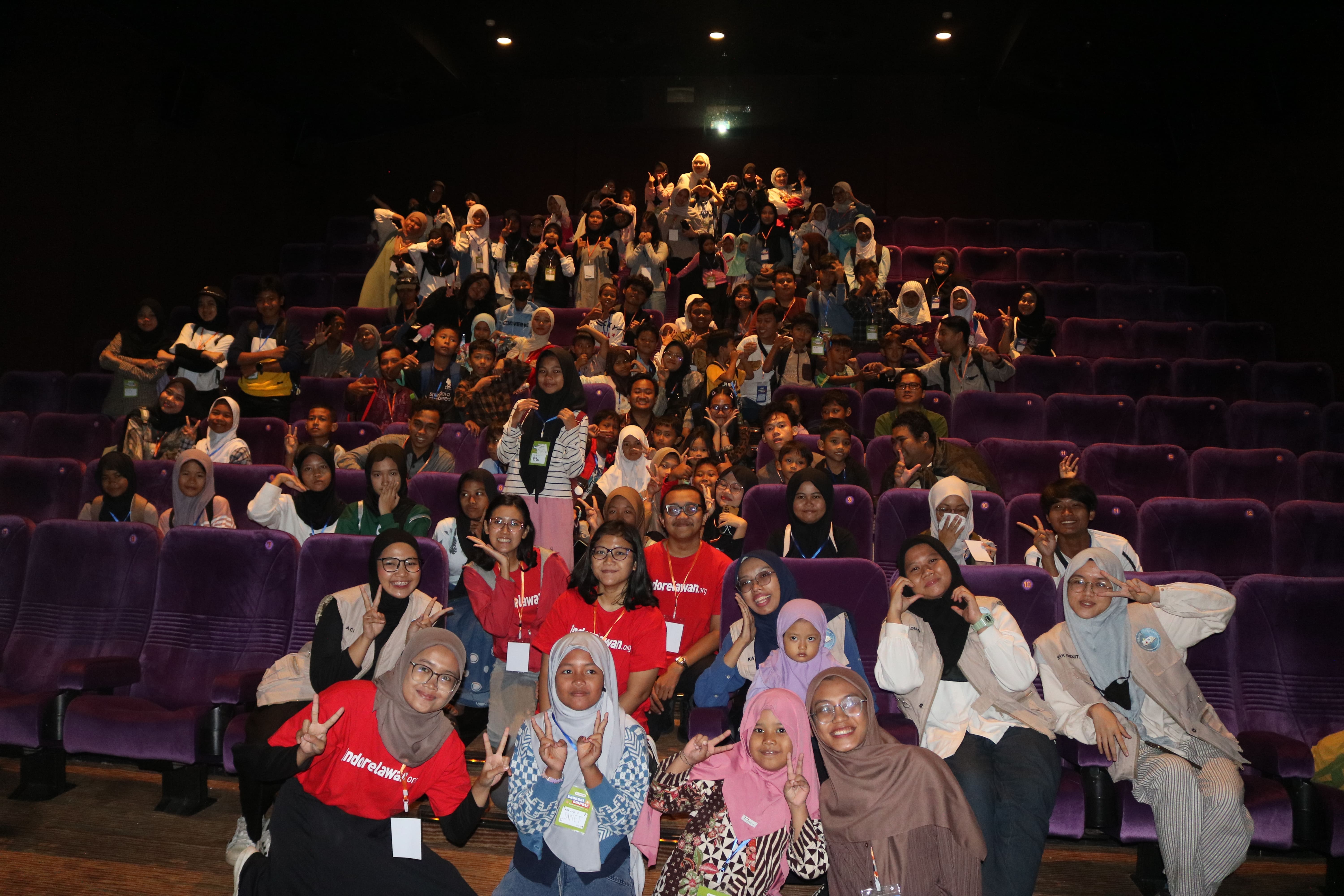 Watching a Movie Together with Children in Theatre